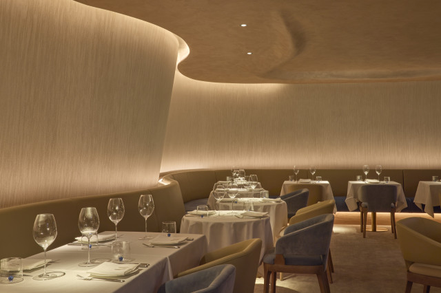 creamy restaurant interiors with curved walls and ceiling