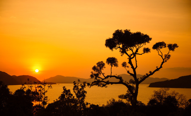 sunset view from sri panwa resort in phuket