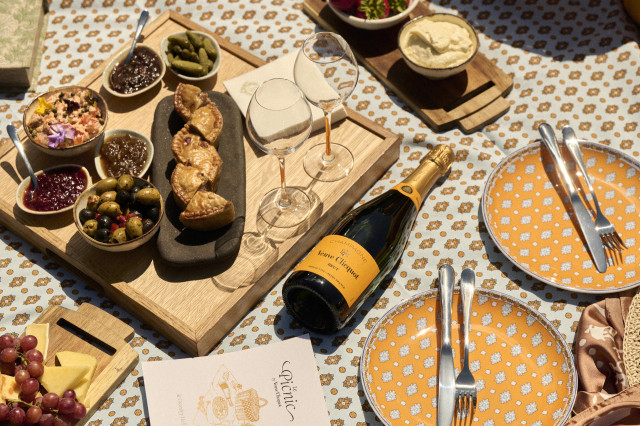 picnic spread with a bottle of Champagne