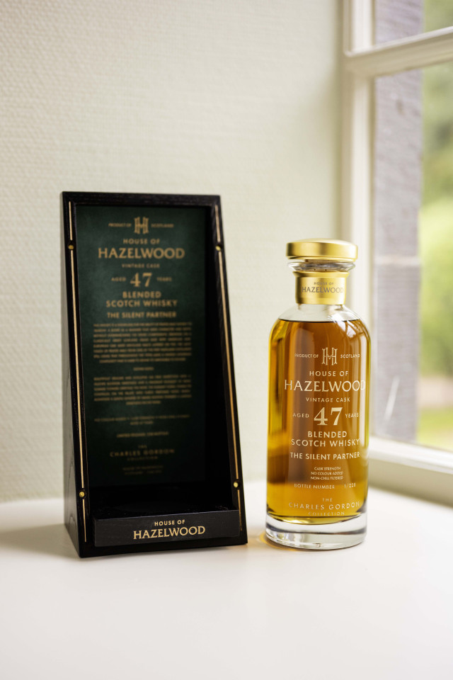 bottle of whisky on windowsill 