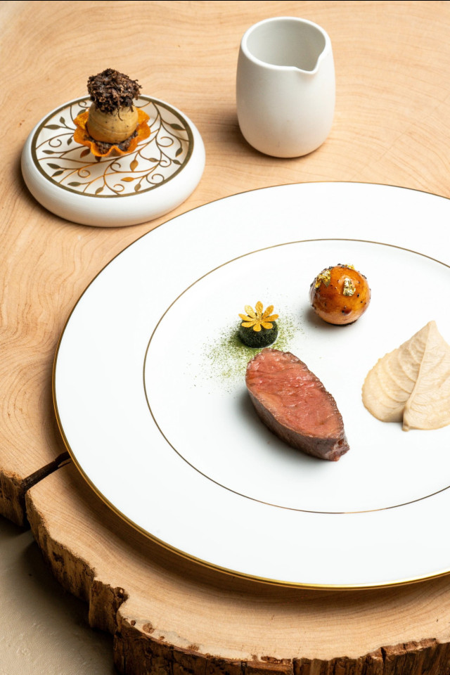 meat dish on white plate 