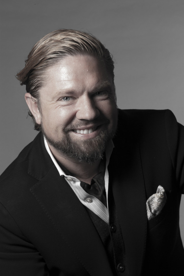 headshot of adam von gootkin