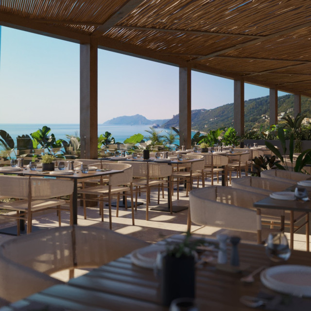 hotel restaurant with reed roofing and sea views