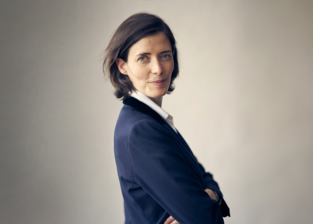 headshot of anne-laure pressat posing with arms crossed 