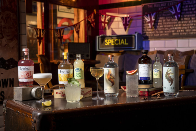 alcohol-free cocktails lined up on leather trunk in a London bar