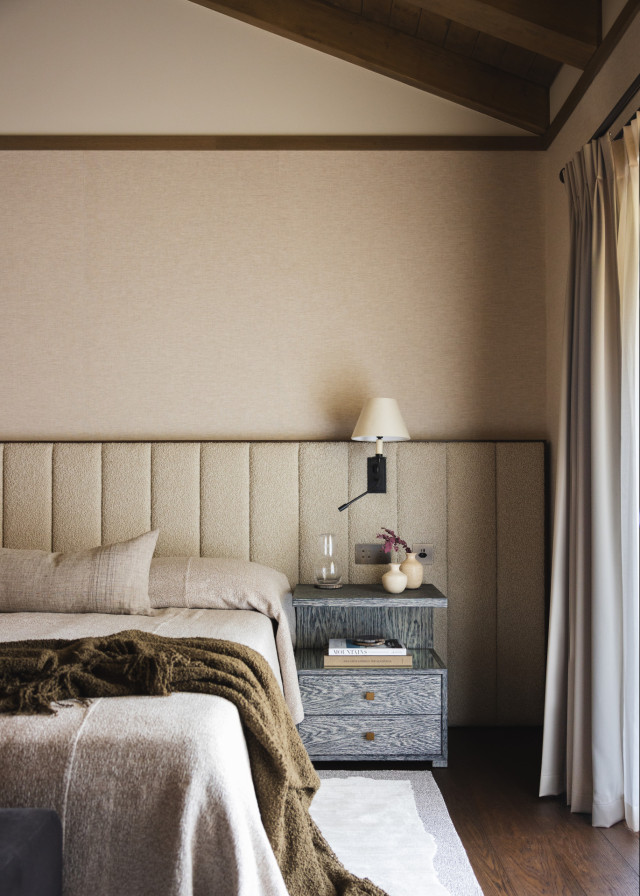 chalet bedroom with long headboard