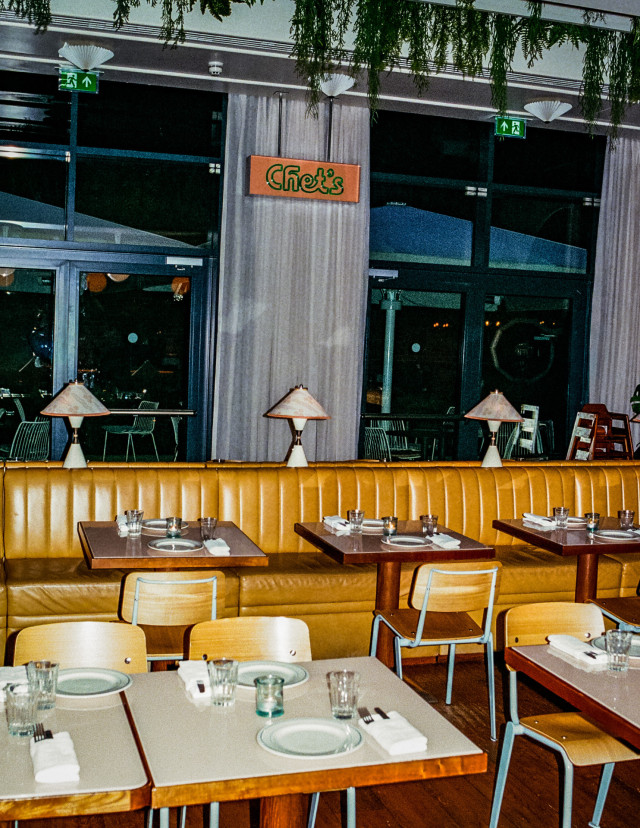 restaurant interior with mustard leather seating
