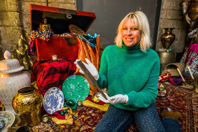 photo of claire watson armstrong holding bamburgh sword
