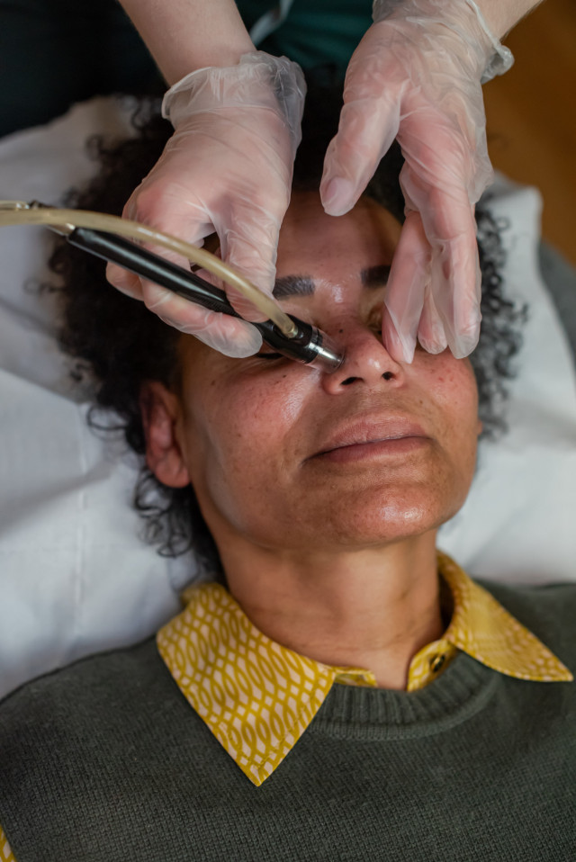 client getting treatment in beauty clinic