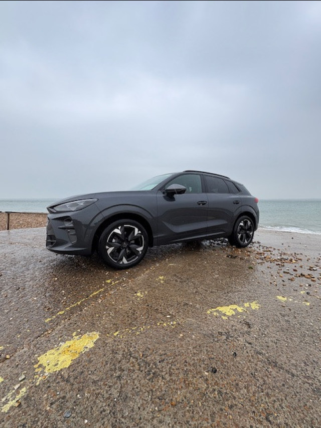 picture of car parked beside sea
