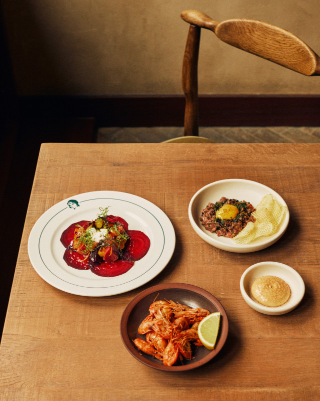 three dishes laid out on restaurant table 