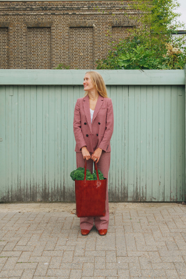 donna hay posing for portrait with bag of veg