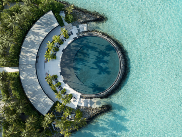 aerial view of pool at maldives hotel 