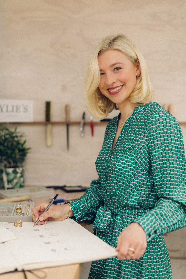 eliza walter in green geometric wrap dress 