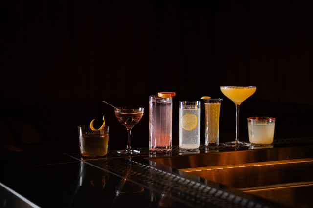 seven cocktails lined up 