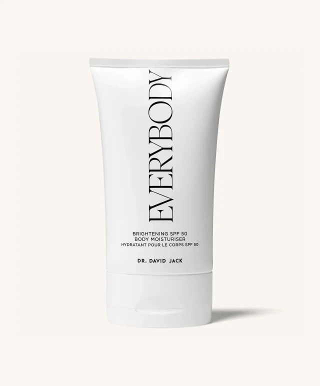 white bottle of body moisturiser with SPF 