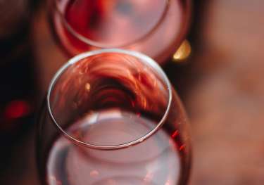 Two glasses of red wine.