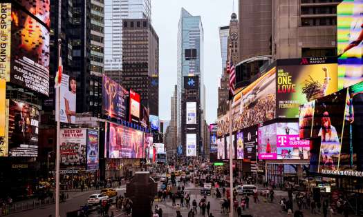 Times square, NYC, a lot of colourful, giant screens.