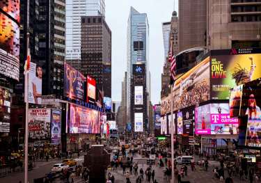 Times square, NYC, a lot of colourful, giant screens.