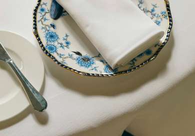 Table setting with blue floral china plate.