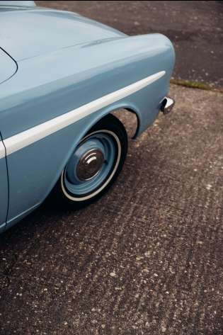 Parked blue vintage car.
