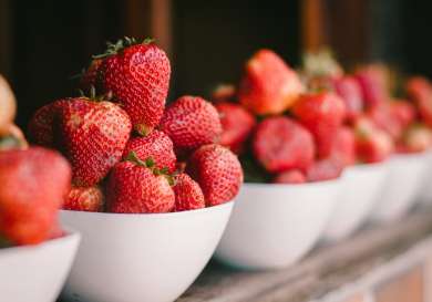 Bowls of ripe strawberries.
