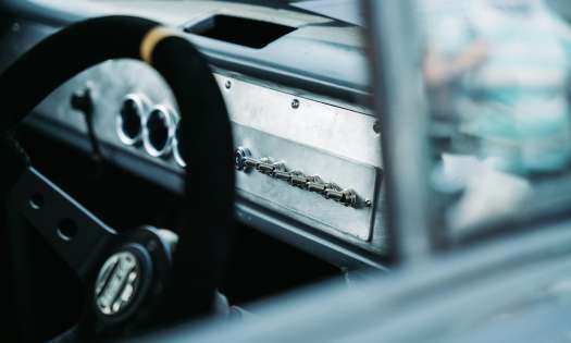 Steering wheel and car dashboard.