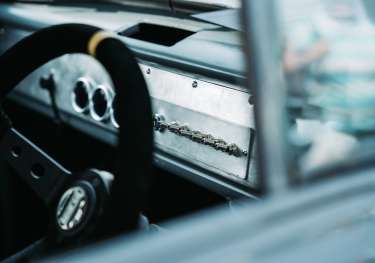 Steering wheel and car dashboard.
