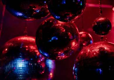 Disco balls with red lighting.
