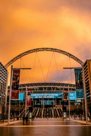 Wembley stadium at sunset.