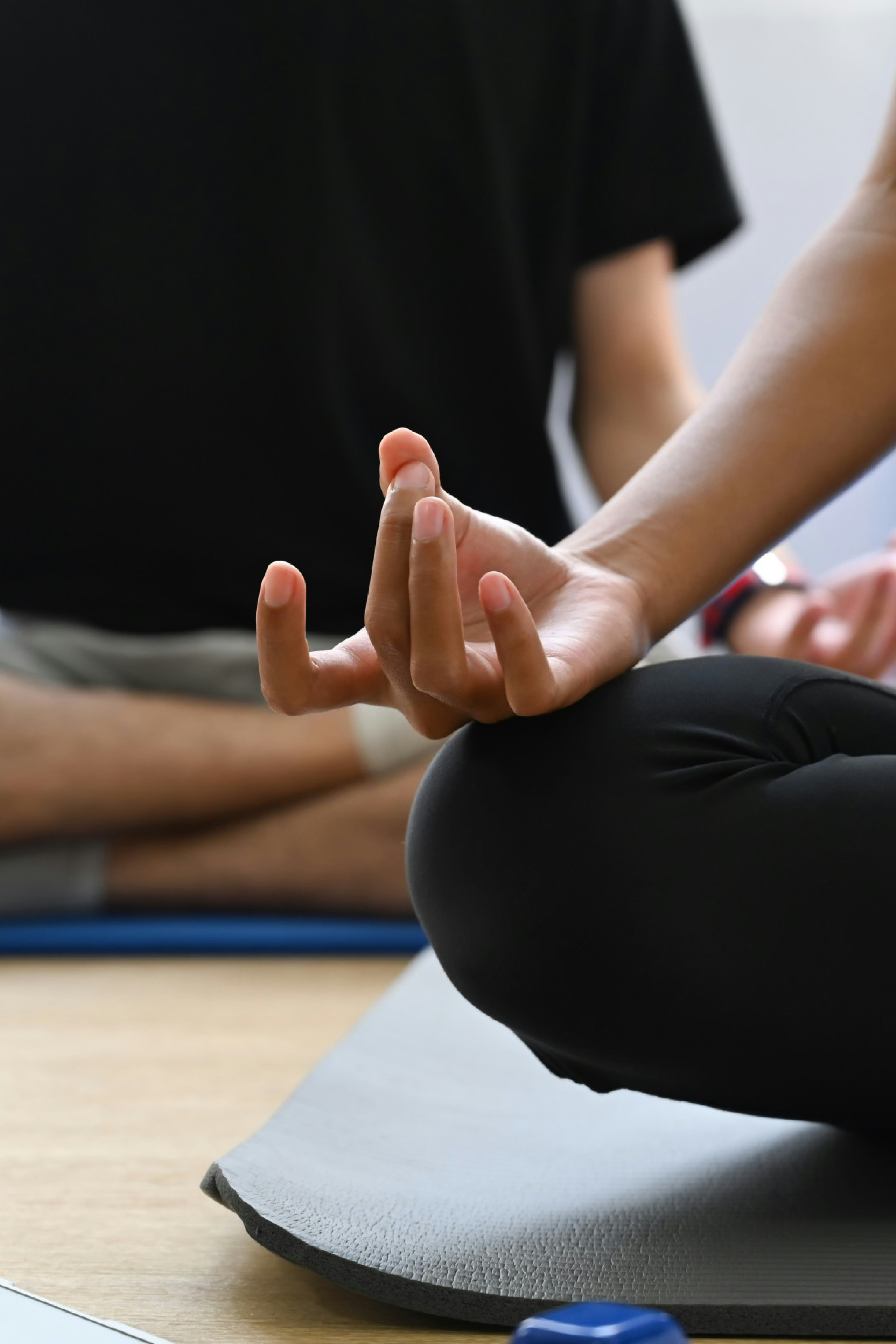 two people doing yoga