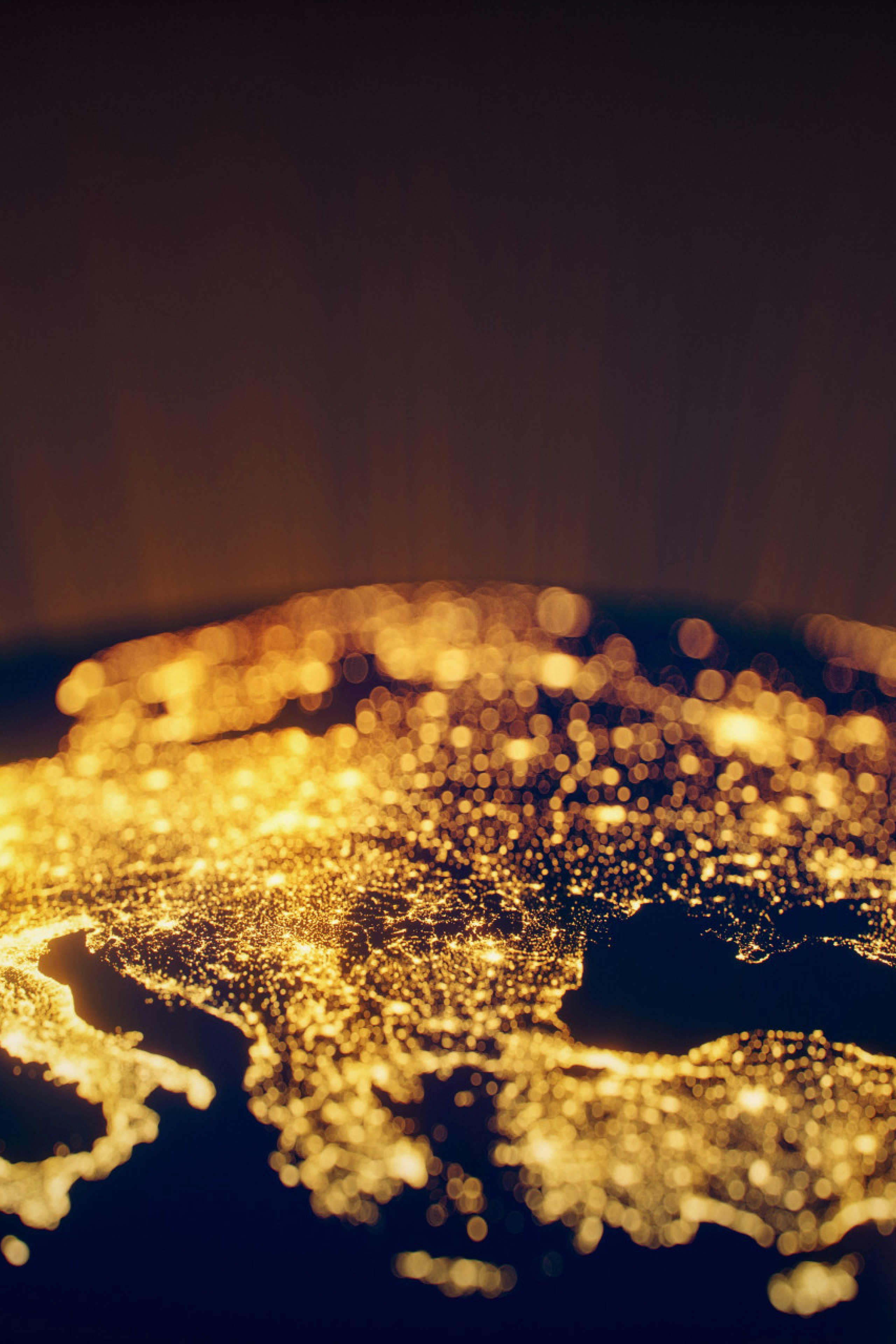 globe of Earth lit up at night on land