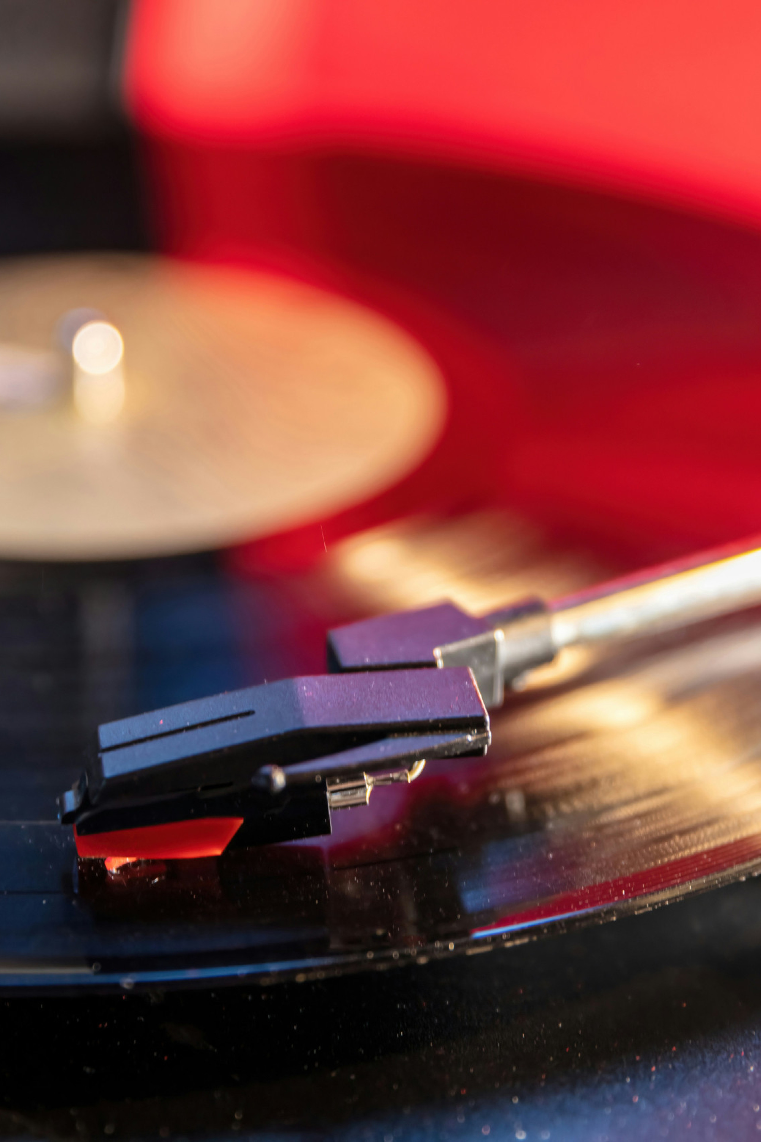 record player with a vinyl inside being played