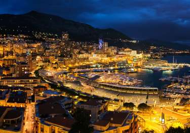 Lit-up city at night - Monte Carlo.