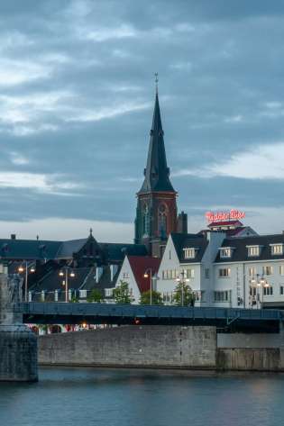 City of Maastricht with a bridge and river in front.