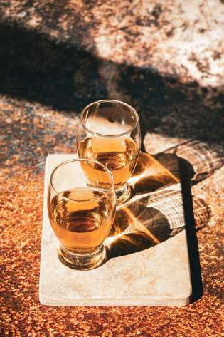 Two glasses of whisky.