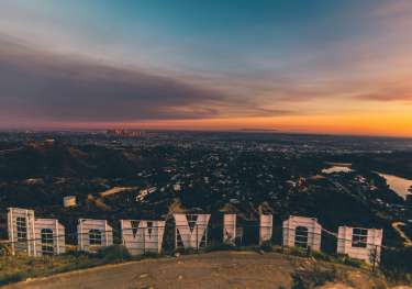 Back of the Hollywood sign at sunset.
