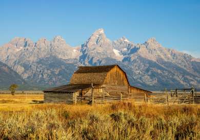 Jackson hole mountain range with hut in foreground.