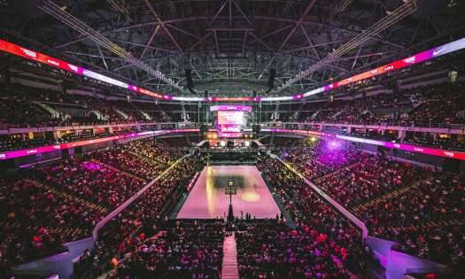 Packed basketball arena.