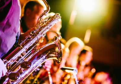 Saxophone with fun lighting behind.