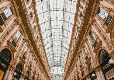 Large building with a glass roof.