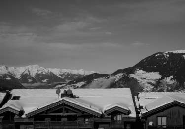 Black and white image of a snowy town: Courchevel, France.