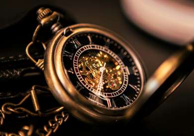 Gold and silver round chronograph watch.