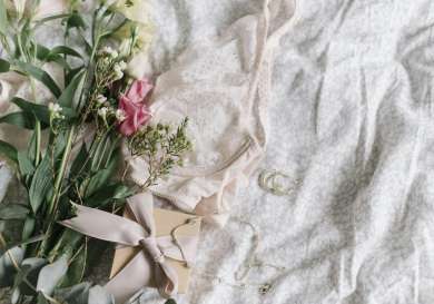 Luxury lingerie styled with flowers and jewellery.