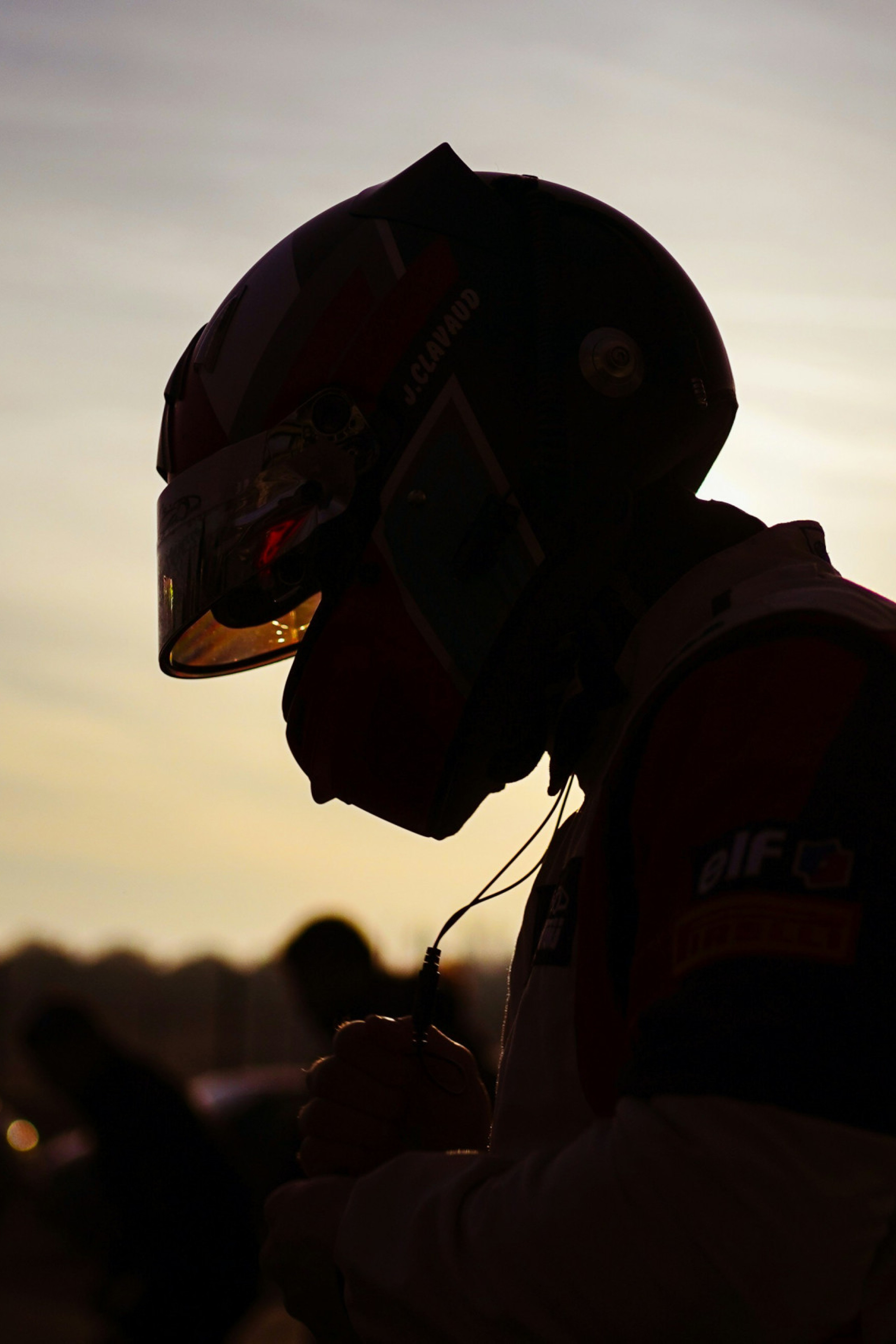 silhouette of racing driver
