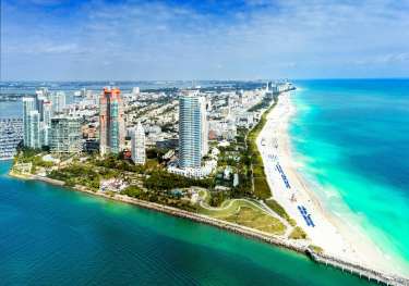 View of miami with sea and blue sky .