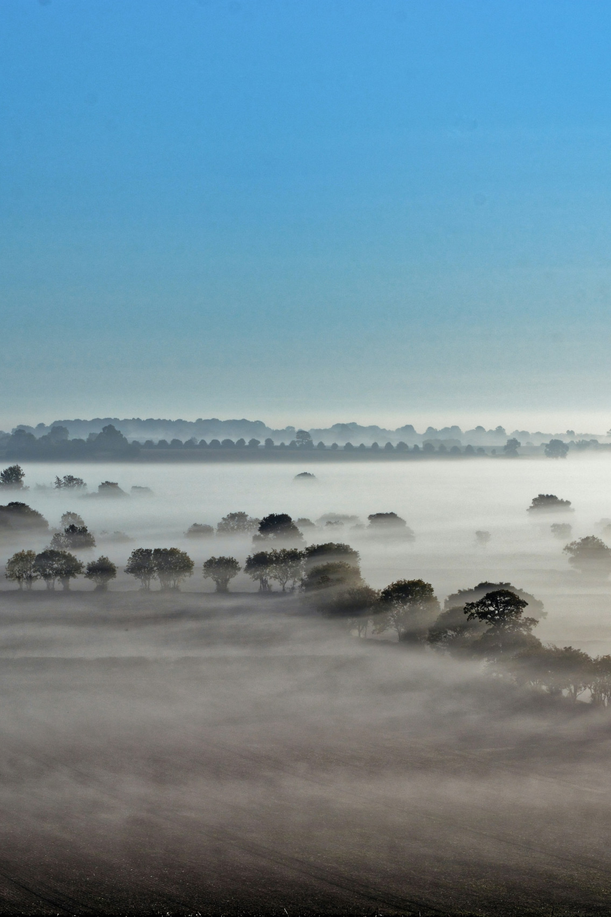 misty view over the cotswolds