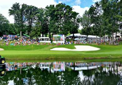 PGA Golf Course with lake in front.