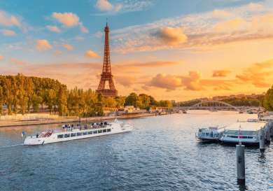 View of the seine in paris during sunset .