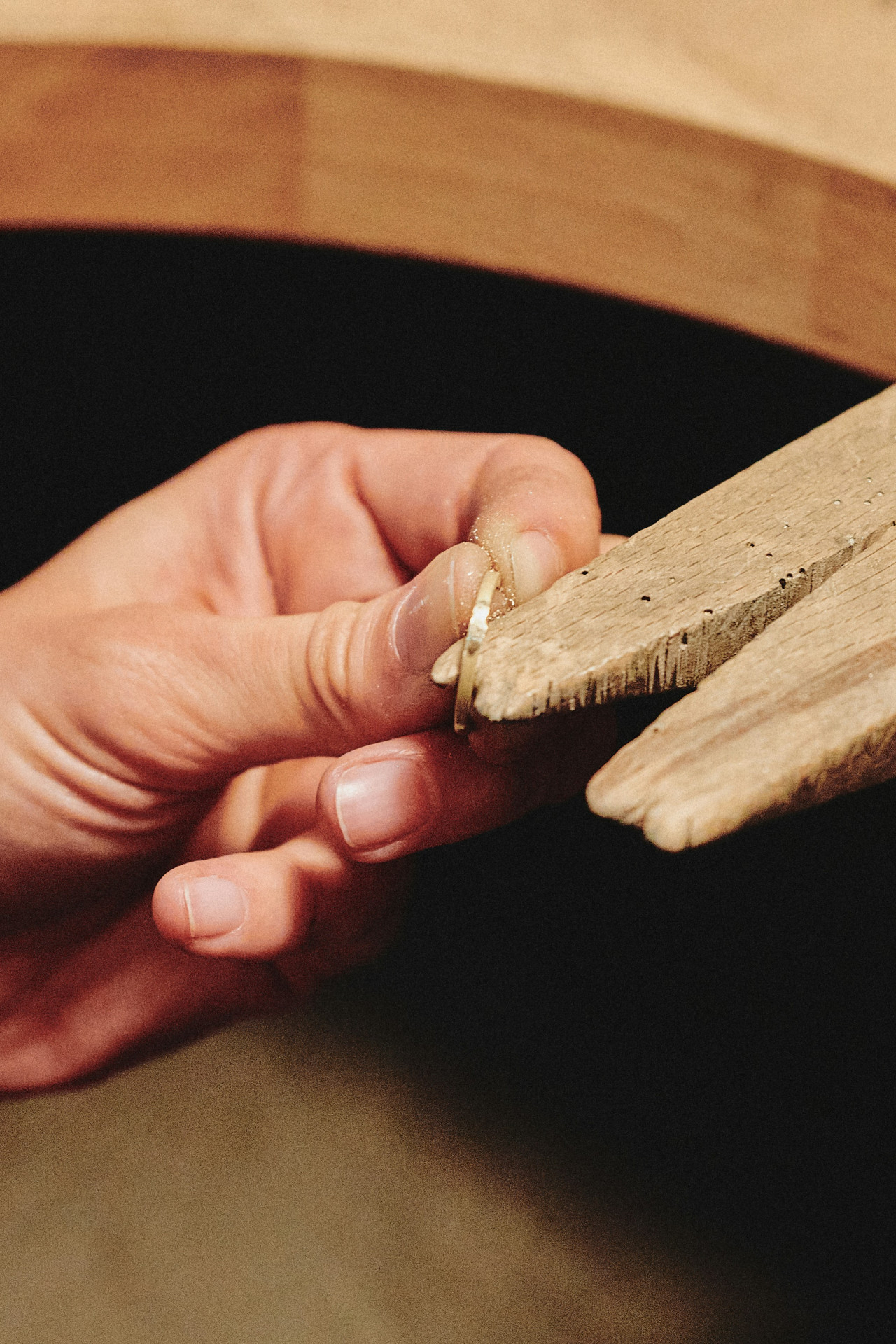 person making ring in workshop
